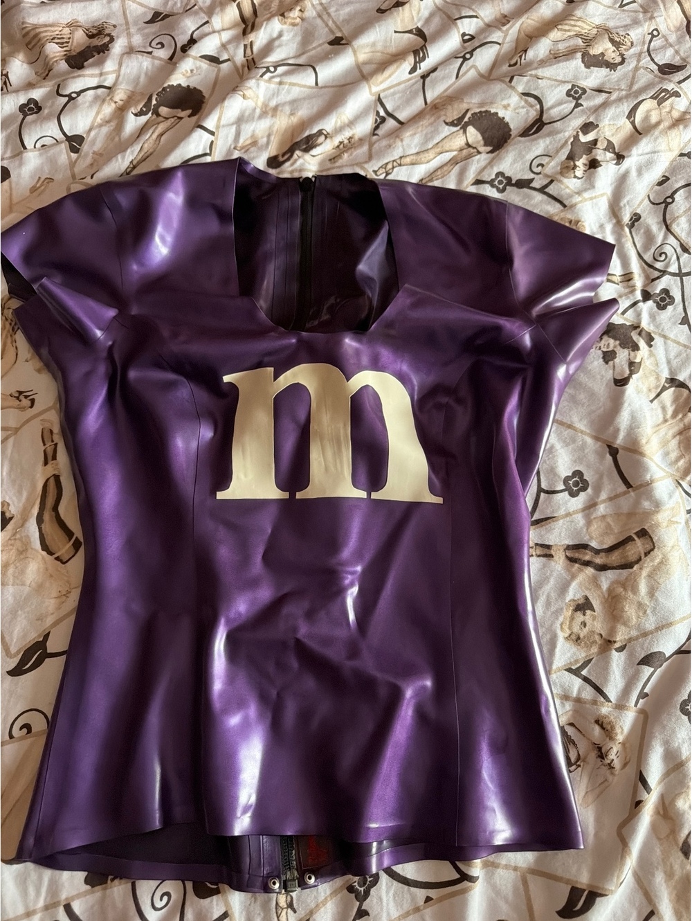 Purple latex “M” top